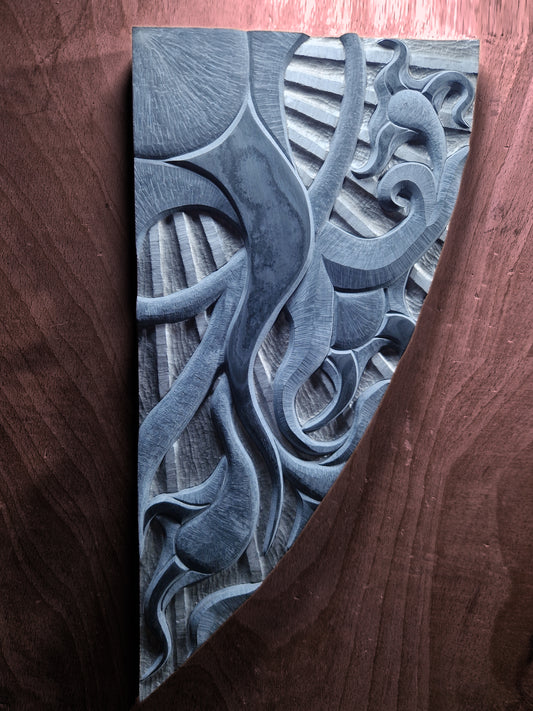 hand carved abstract wall relief